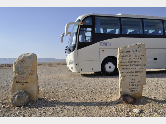  Info stones with bus in front of the local